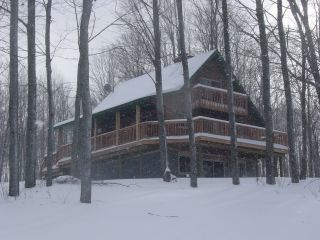 Front view of Alpine Snow Cabin in Gaylord Michigan.